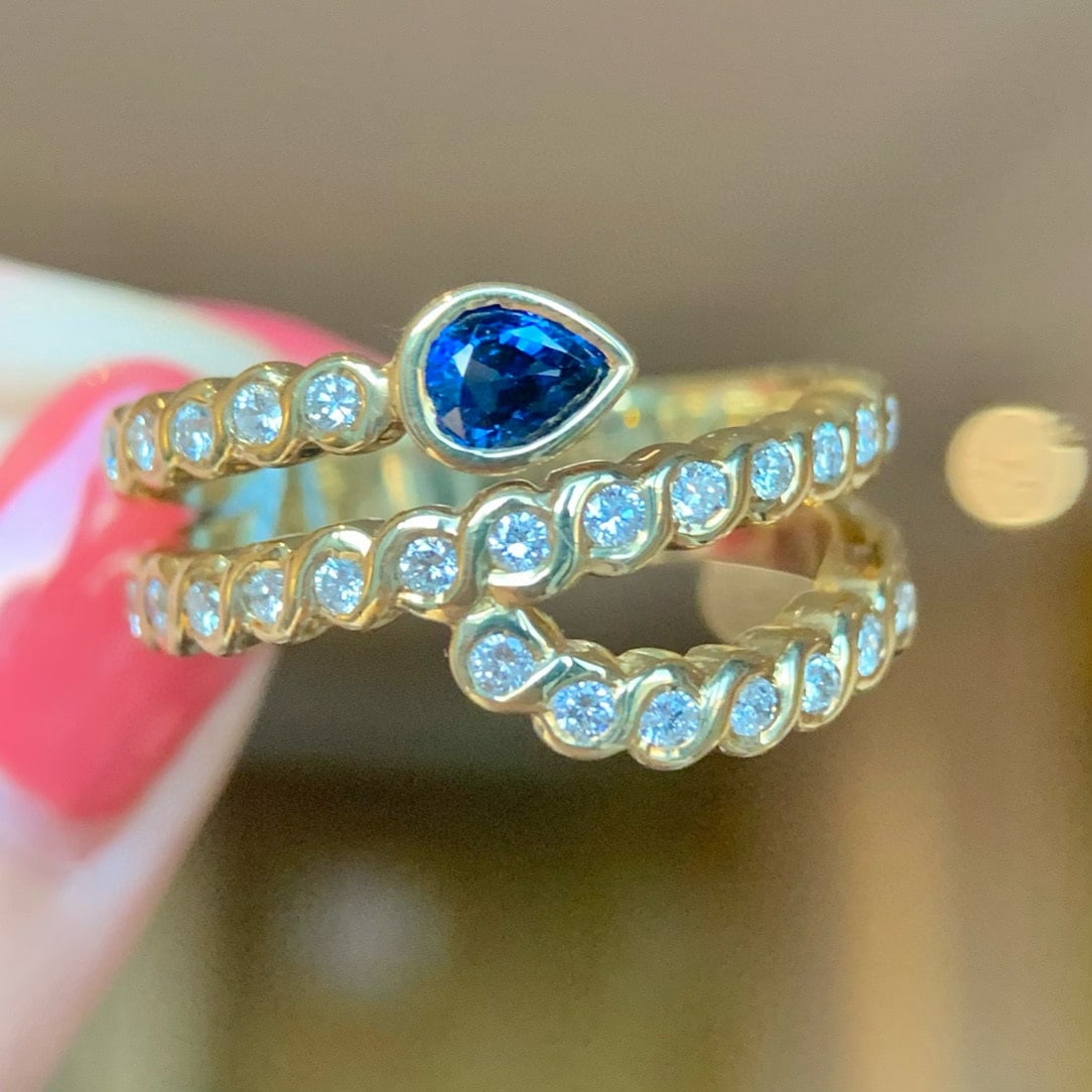 14k Gold 0.98 Ctw Natural Sapphire & Diamond Ring: Ref:230992296 // gold content:14k gold // ring size:7. 25us // // main gemstone:sapphire // shape:pear // carat weight:0. 47ct // color:blue // treatment:natural // // adjacent gemstone 2 : diamond