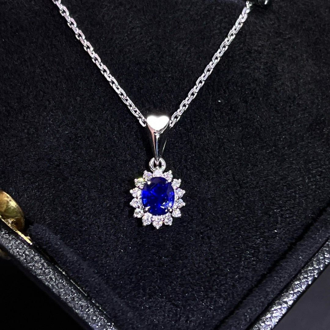 14k Gold 0.75 Ctw Natural Sapphire & Diamond Pendant( Without Chain ): Ref:230992334 // gold content:14k gold // main gemstone:sapphire // shape:oval // carat weight:0. 61ct // color:blue // treatment:natural // // adjacent gemstone 2 : diamond // shape:round // carat
