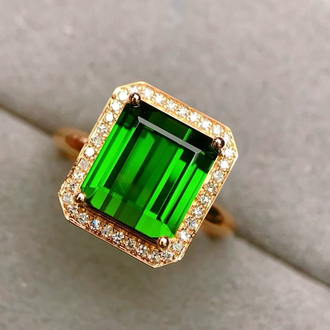 14k Gold 6.08 Ctw Natural Tourmaline & Diamond Ring: Ref:230992351 // gold content:14k gold // ring size:7. 25us // // main gemstone:tourmaline // shape:octagonal // carat weight:5. 9ct // color:green // treatment:natural // // adjacent gemstone 2 : dia