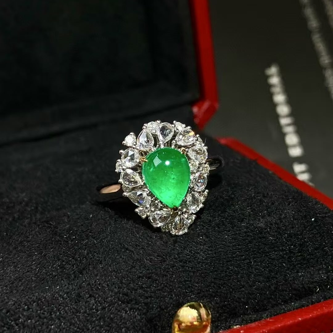 14k Gold 1.97 Ctw Vivid Green Natural Emerald & Diamond Ring: Ref:230992356 // gold content:14k gold // ring size:7. 25us // // main gemstone:emerald // shape:pear // carat weight:1. 36ct // color:vivid green // treatment:natural // // adjacent gemstone 2 : diam