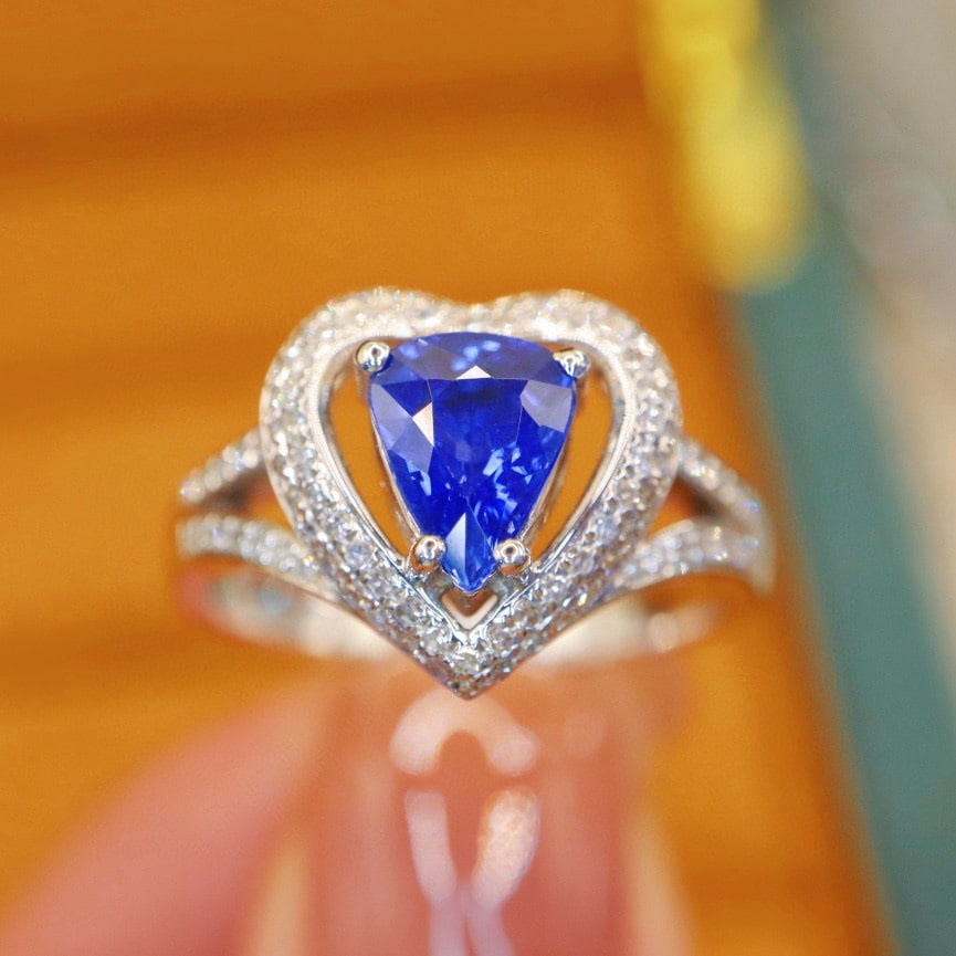 14k Gold 1.67 Ctw Natural Sapphire & Diamond Ring: Ref:230992361 // gold content:14k gold // ring size:7. 25us // // main gemstone:sapphire // shape:pear // carat weight:1. 28ct // color:royal blue // treatment:natural // // adjacent gemstone 2 :
