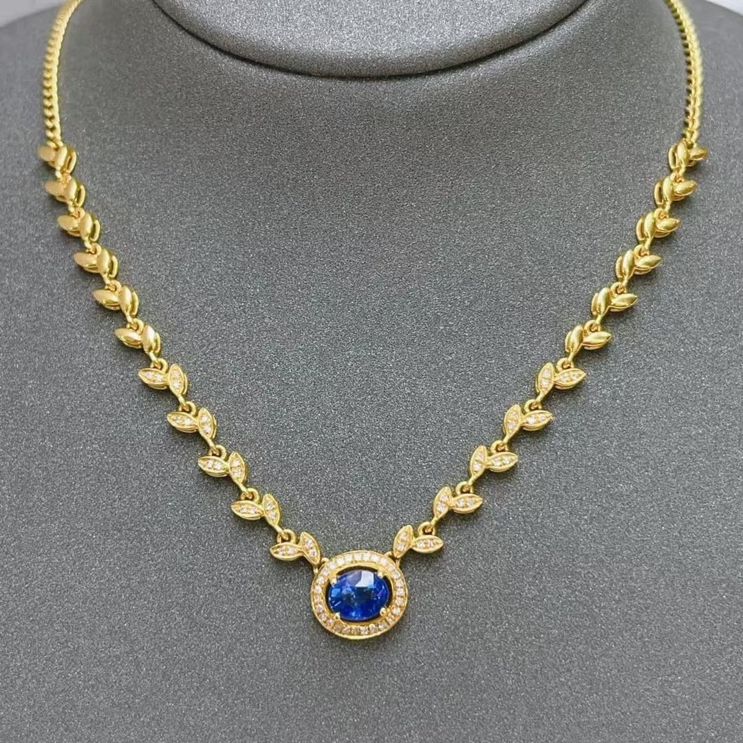 14k Gold 0.73 Ct Natural Sapphire & Diamond Necklace: Ref:230992364 // gold content:14k gold // main gemstone:sapphire // shape:oval // carat weight:0. 73ct // color:blue // treatment:natural // // adjacent gemstone 2 : diamond // number of stones:68 //