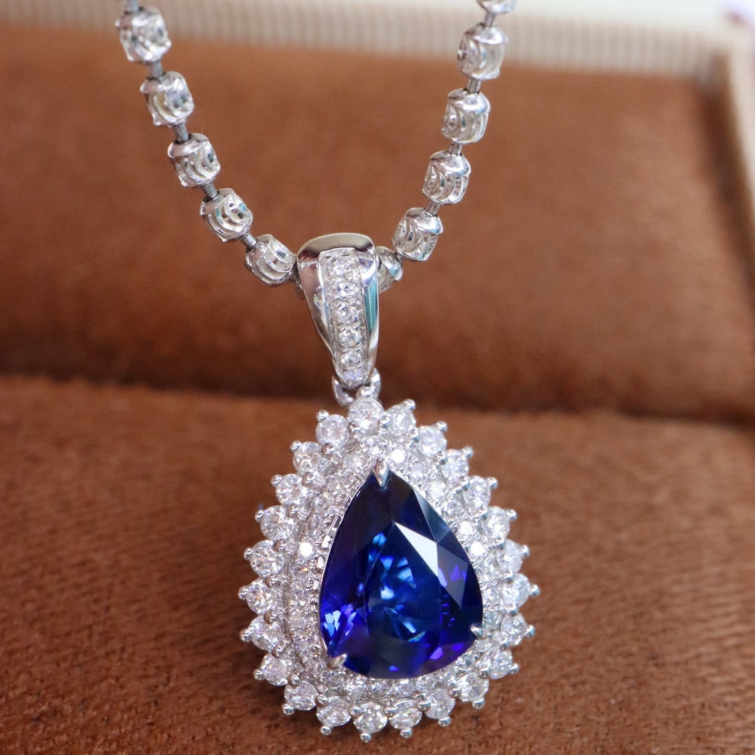 14k Gold 1.78 Ctw Natural Sapphire & Diamond Pendant( Without Chain ): Ref:230992375 // gold content:14k gold // main gemstone:sapphire // shape:pear // carat weight:1. 39ct // color:royal blue // treatment:natural // // adjacent gemstone 2 : diamond // shape:round //