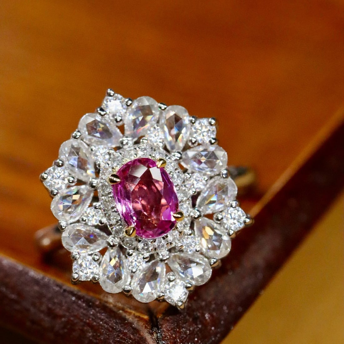14k Gold 0.78 Ctw Natural Padparadscha Sapphire & Diamond Ring: Ref:230992380 // gold content:14k gold // ring size:7. 25us // // main gemstone:padparadscha sapphire // shape:oval // carat weight:0. 69ct // color:orangish pink // treatment:natural // // adjacent