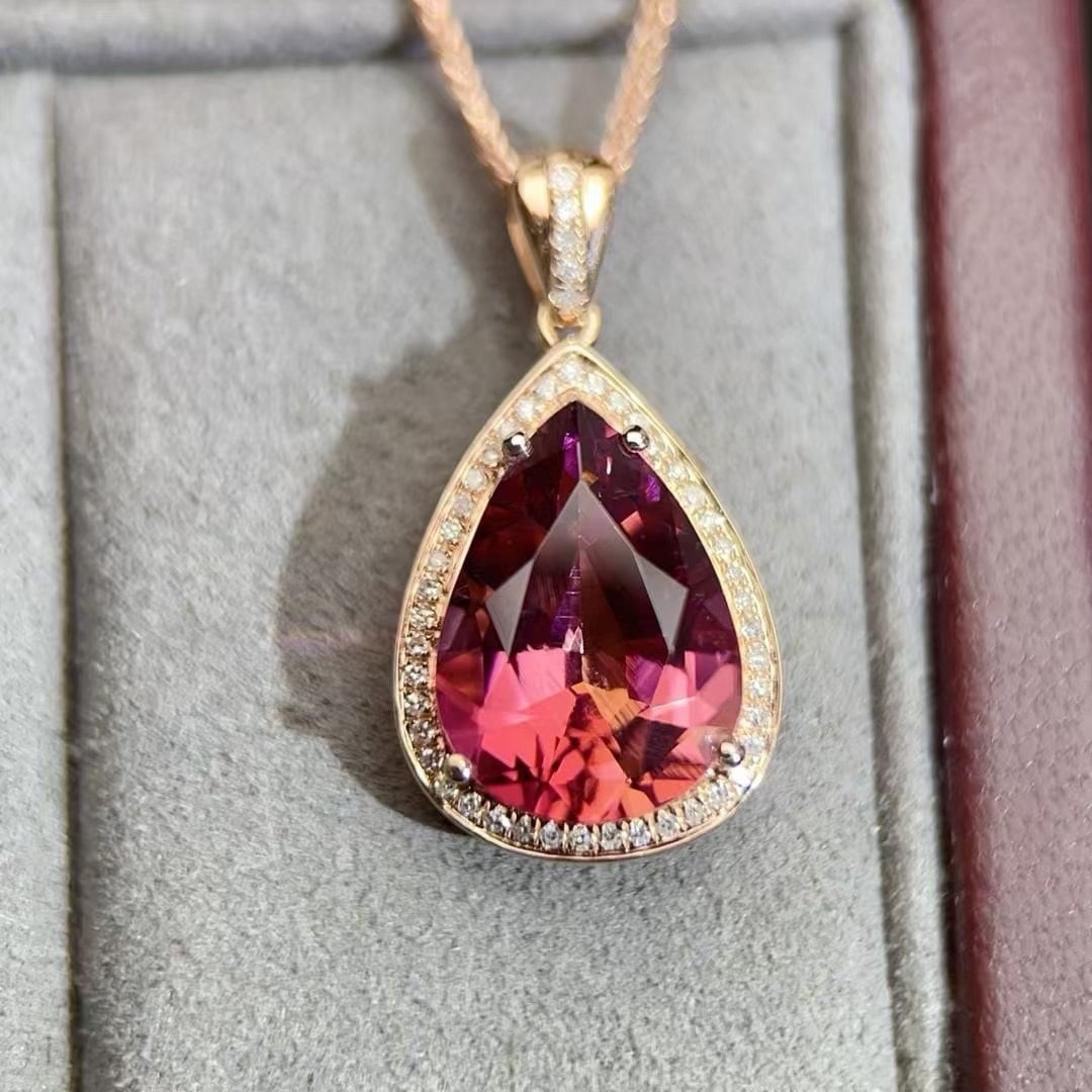 14k Gold 1.65 Ct Natural Tourmaline & Diamond Pendant( Without Chain ): Ref:230992408 // gold content:14k gold // main gemstone:tourmaline // shape:pear // carat weight:1. 65ct // color:red // treatment:natural // // adjacent gemstone 2 : diamond // number of stones:38 //