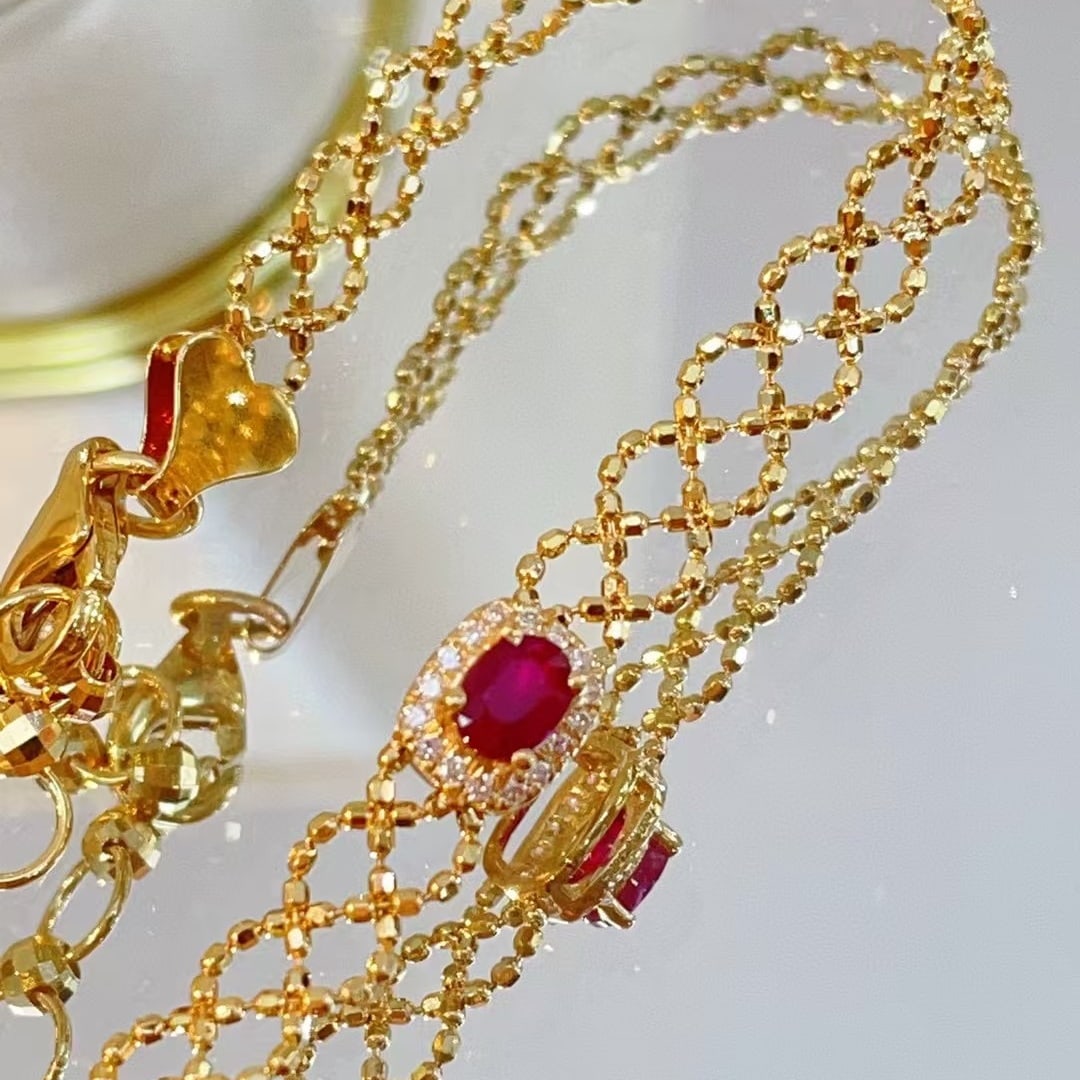 14k Gold 0.25 Ct Natural Ruby & Diamond Bracelet: Ref:230992421 // gold content:14k gold // main gemstone:ruby // shape:oval // carat weight:0. 25ct // color:red // treatment:natural // // adjacent gemstone 2 : diamond // shape:round // clarity