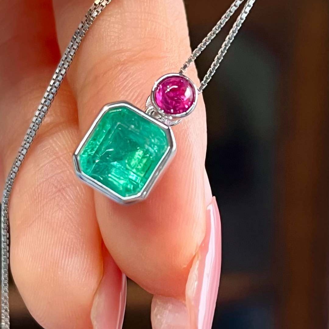 14k Gold 3.35 Ctw Natural Emerald & Ruby Pendant( Without Chain ): Ref:230992444 // gold content:14k gold // main gemstone:emerald // shape:octagonal // carat weight:3. 06ct // color:green // treatment:natural // // adjacent gemstone 2 : ruby // shape:round // carat