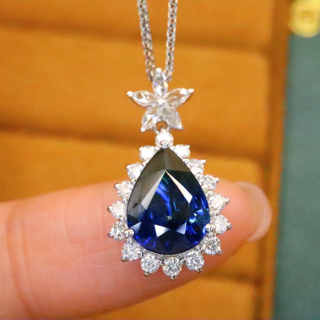 14k Gold 2.44 Ctw Natural Sapphire & Diamond Pendant( Without Chain ): Ref:230992449 // gold content:14k gold // main gemstone:sapphire // shape:pear // carat weight:2. 06ct // color:royal blue // treatment:natural // // adjacent gemstone 2 : diamond // number of stones: