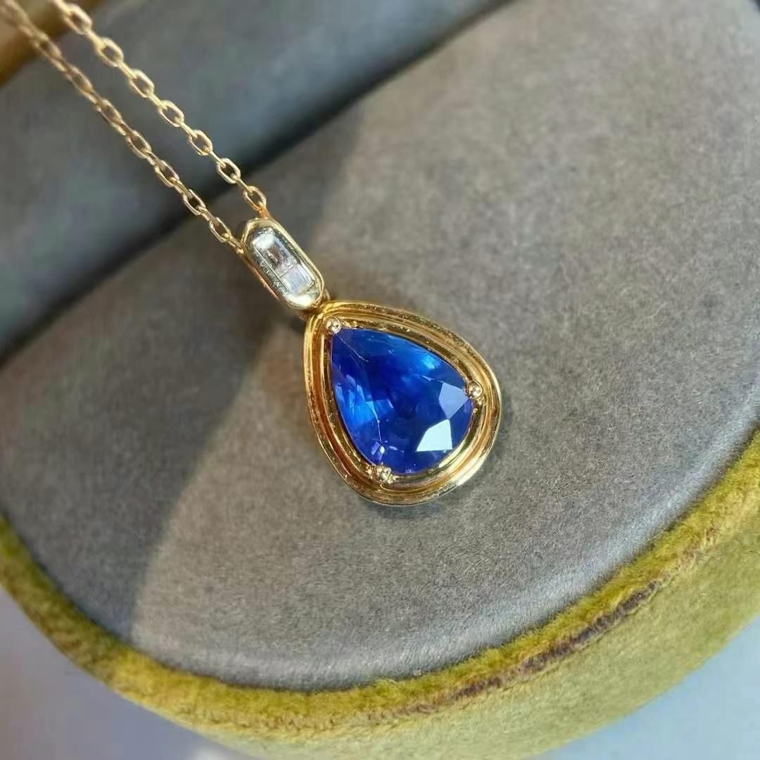14k Gold 1.4 Ct Natural Sapphire & Diamond Pendant( Without Chain ): Ref:230993023 // gold content:14k gold // main gemstone:sapphire // shape:pear // carat weight:1. 4ct // color:cornflower blue // treatment:natural // // adjacent gemstone 2 : diamond //