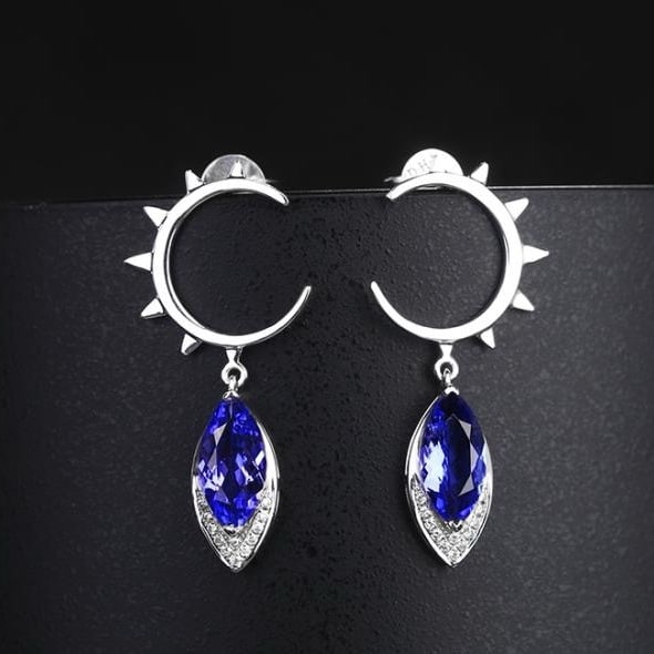 14k Gold 1.55 Ctw Natural Tanzanite & Diamond Earrings: Ref:230993033 // gold content:14k gold // main gemstone:tanzanite // shape:marquise // carat weight:1. 48ct // color:blue // treatment:natural // // adjacent gemstone 2 : diamond // shape:round //