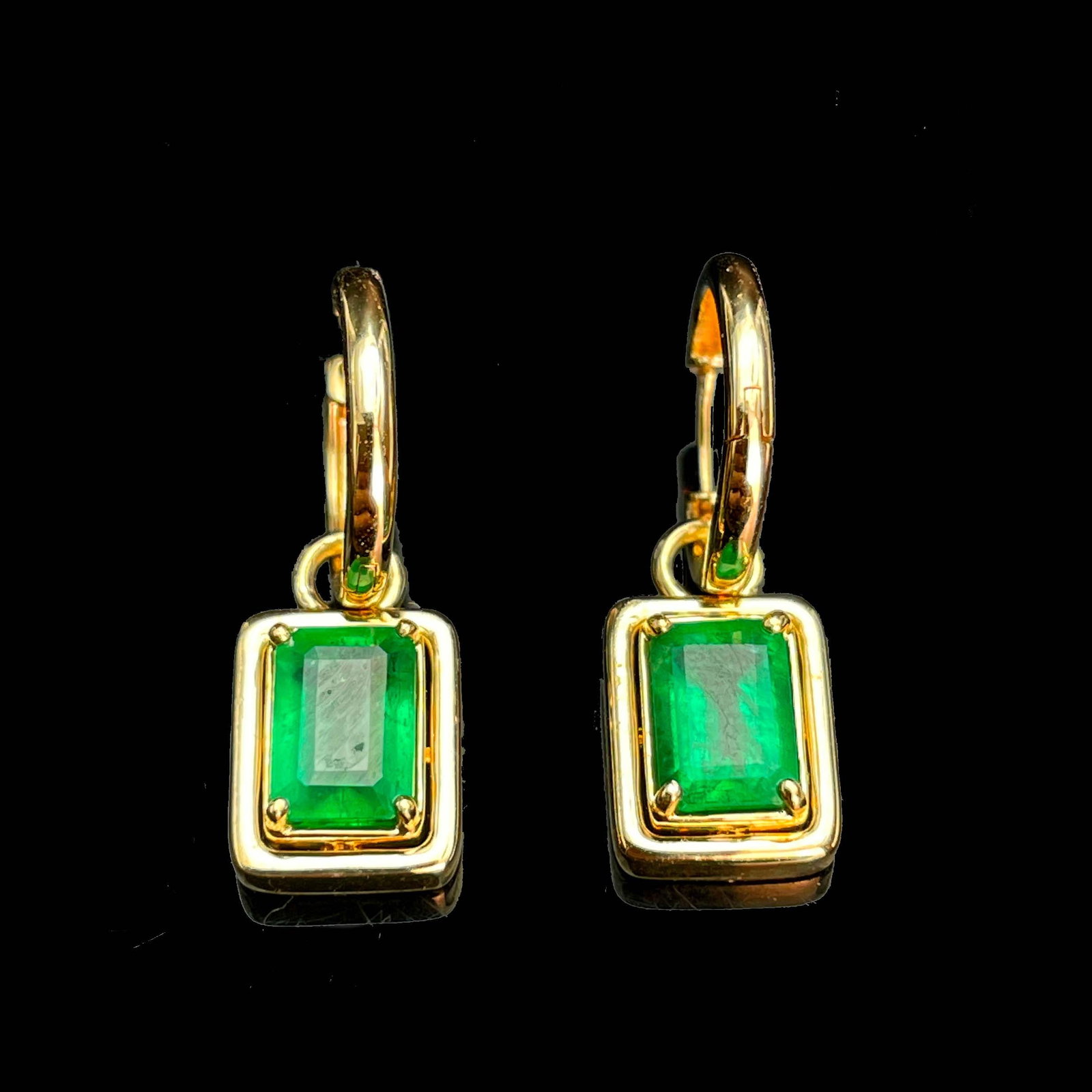 14k Gold 1.28 Ct Natural Emerald Earrings: Ref:230993042 // gold content:14k gold // main gemstone:emerald // shape:octagonal // carat weight:1. 28ct // color:green // treatment:natural // High Estimate: 4300 Condition: New Low Estimate: 2900