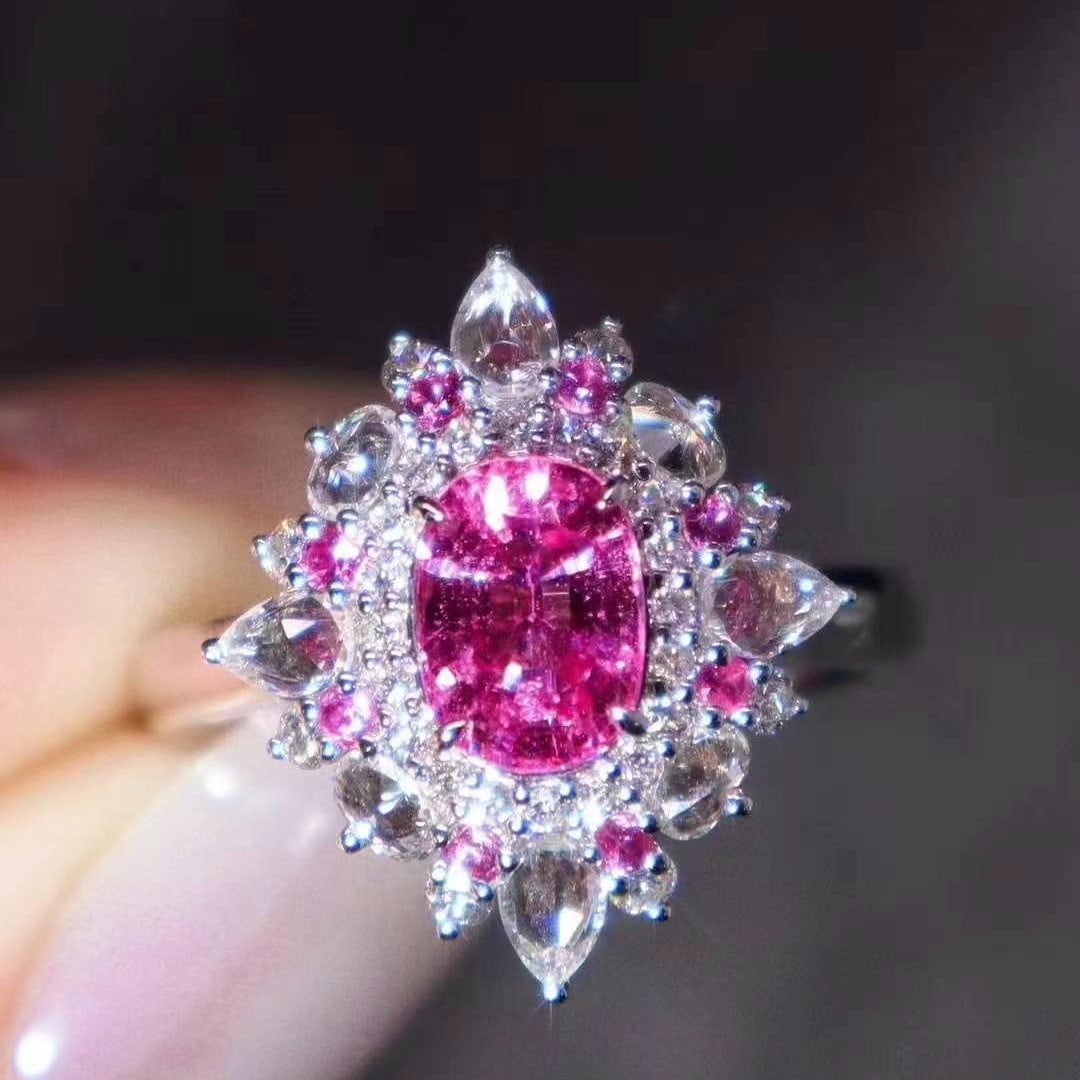 14k Gold 1.98 Ctw Natural Padparadscha Sapphire & Diamond Ring: Ref:230993054 // gold content:14k gold // ring size:7. 25us // // main gemstone:padparadscha sapphire // shape:oval // carat weight:1. 40ct // color:orangish pink // treatment:natural // // adjacent g
