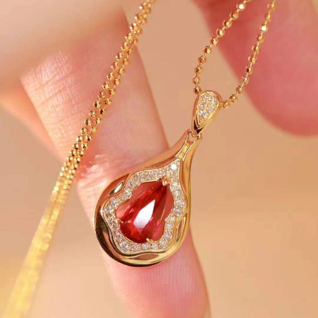 14k Gold 1.12 Ctw Natural Ruby & Diamond Pendant( Without Chain ): Ref:230993056 // gold content:14k gold // main gemstone:ruby // shape:pear // carat weight:1. 01ct // color:pigeonblood red // treatment:natural // // adjacent gemstone 2 : diamond // shape:round // c