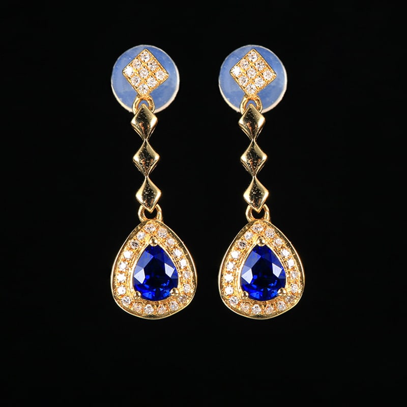 14k Gold 0.67 Ctw Vivid Blue Natural Sapphire & Diamond Earrings: Ref:230993095 // gold content:14k gold // main gemstone:sapphire // shape:pear // carat weight:0. 51ct // color:vivid blue // treatment:natural // // adjacent gemstone 2 : diamond // number of stones: