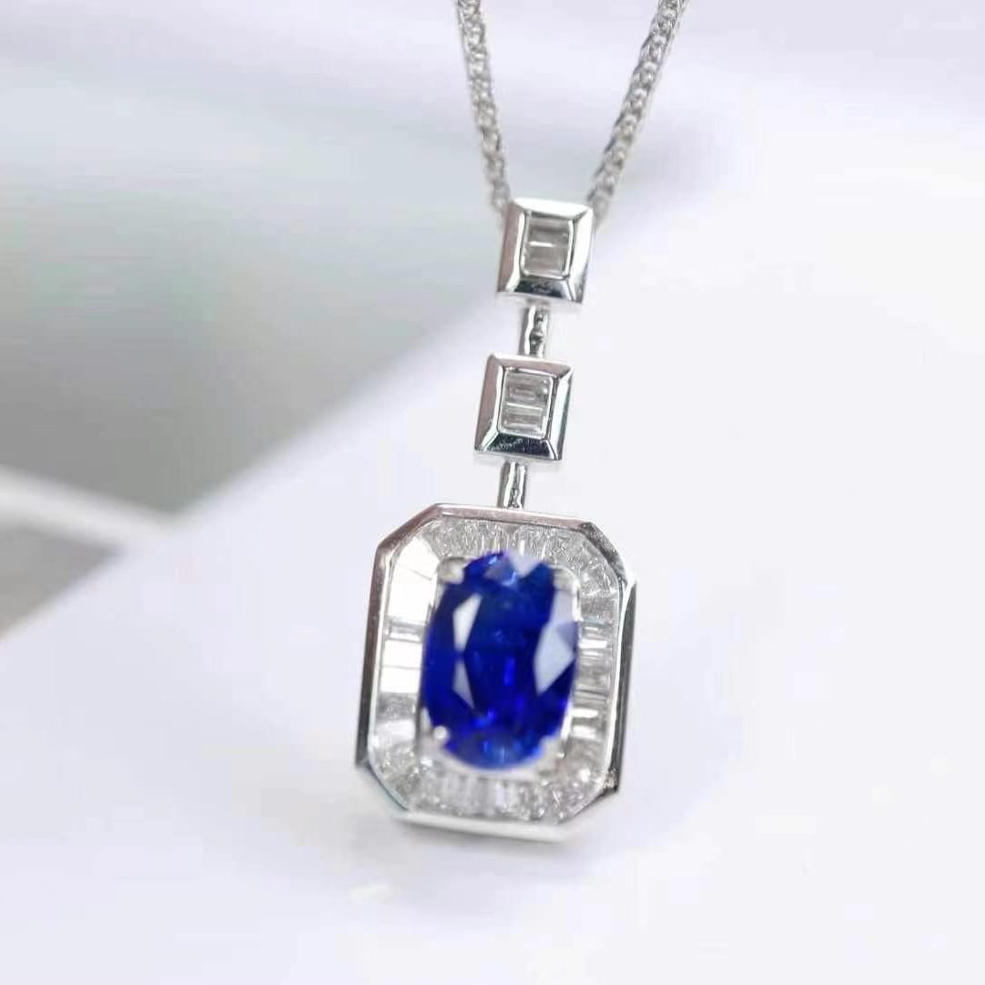 14k Gold 1.18 Ctw Natural Sapphire & Diamond Pendant( Without Chain ): Ref:230993106 // gold content:14k gold // main gemstone:sapphire // shape:oval // carat weight:1ct // color:royal blue // treatment:natural // // adjacent gemstone 2 : diamond // shape:baguette // car