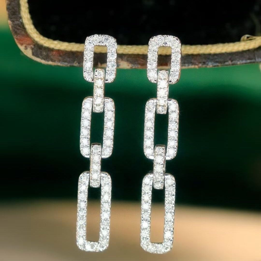 14k Gold 0.56 Ct Natural H Diamond Earrings: Ref:230993111 // gold content:14k gold // main gemstone:diamond // shape:round // carat weight:0. 56ct // clarity grade:vs-si // color:h // treatment:natural // cut grade:g // Low Estimate: 2600 High