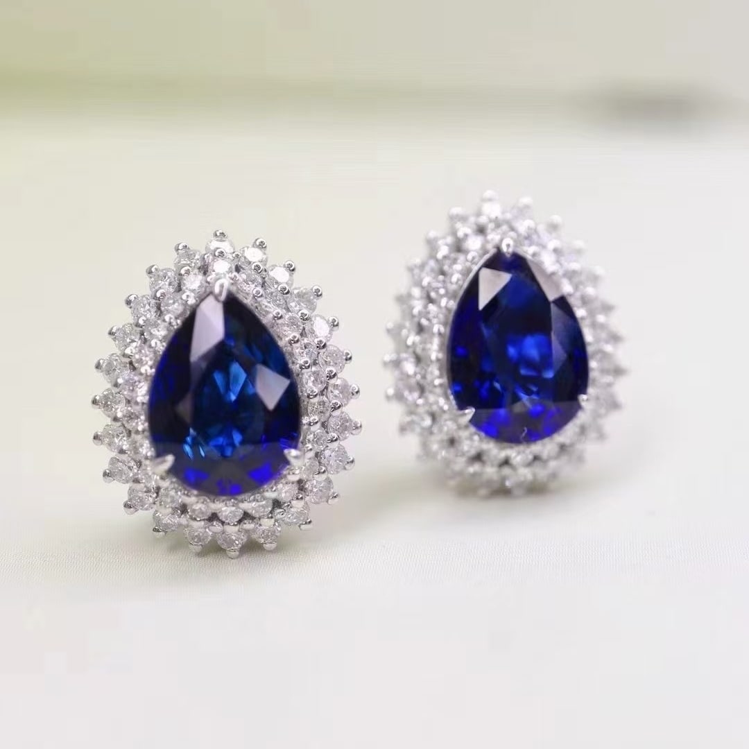 14k Gold 3.16 Ctw Natural Sapphire & Diamond Earrings: Ref:230993131 // gold content:14k gold // main gemstone:sapphire // shape:pear // carat weight:2. 55ct // color:royal blue // treatment:natural // // adjacent gemstone 2 : diamond // shape:round // ca