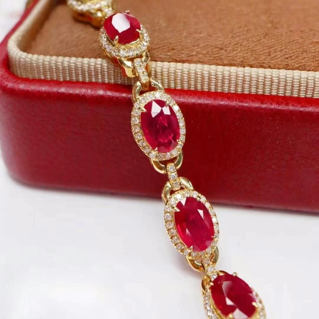 14k Gold 3.87 Ctw Natural Ruby & Diamond Bracelet: Ref:230993134 // gold content:14k gold // main gemstone:ruby // shape:oval // carat weight:3. 44ct // color:pigeonblood red // treatment:natural // // adjacent gemstone 2 : diamond // shape:round // c
