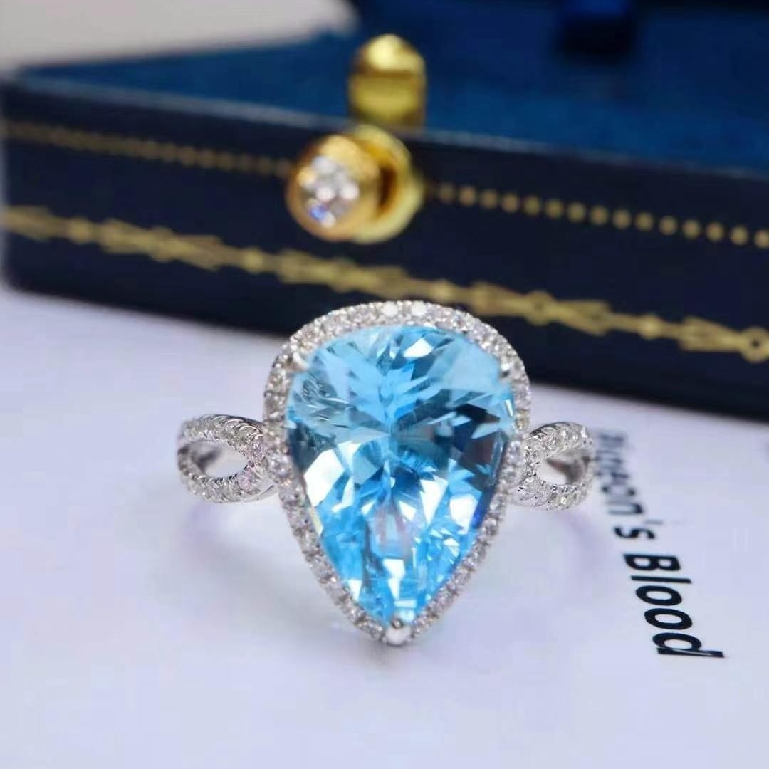 14k Gold 4.14 Ctw Natural Aquamarine & Diamond Ring: Ref:230993136 // gold content:14k gold // ring size:7. 25us // // main gemstone:aquamarine // shape:pear // carat weight:3. 8ct // color:santa maria color // treatment:natural // // adjacent gemstone