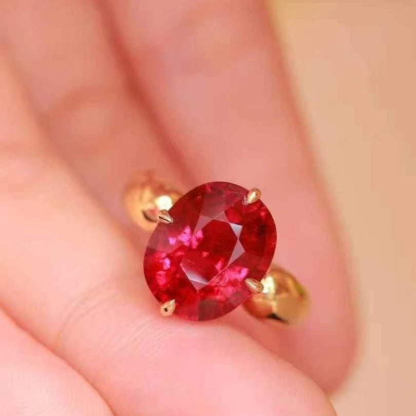 14k Gold 5.43 Ct Natural Tourmaline Ring: Ref:230993145 // gold content:14k gold // ring size:7. 25us // // main gemstone:tourmaline // shape:oval // carat weight:5. 43ct // color:red // treatment:natural // Condition: New High Estimate: 1600