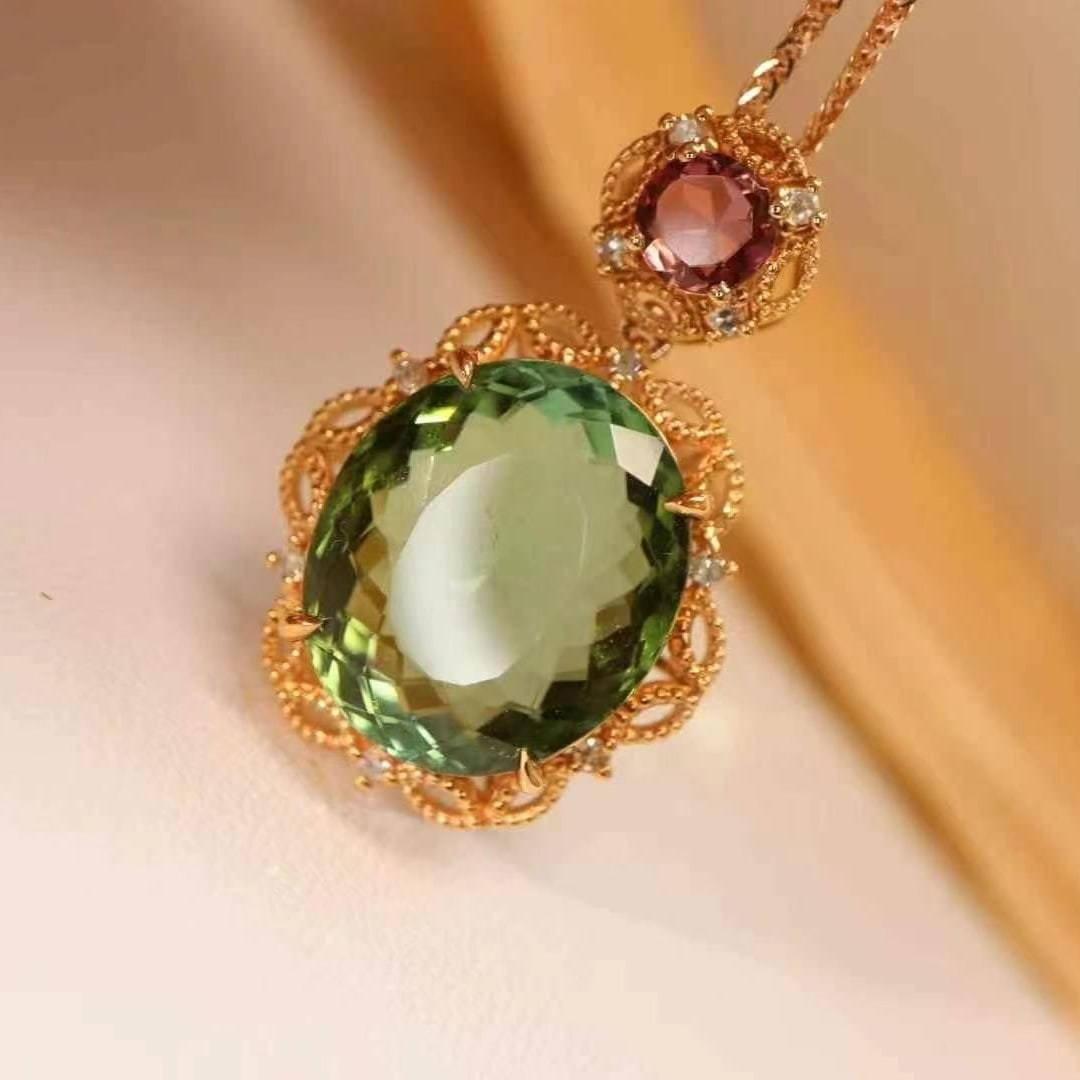 14k Gold 9.15 Ct Natural Tourmaline & Tourmaline & Diamond Pendant( Without Chain ): Ref:230993151 // gold content:14k gold // main gemstone:tourmaline // shape:oval // carat weight:9. 15ct // color:green // treatment:natural // // adjacent gemstone 2 : tourmaline // shape:round //