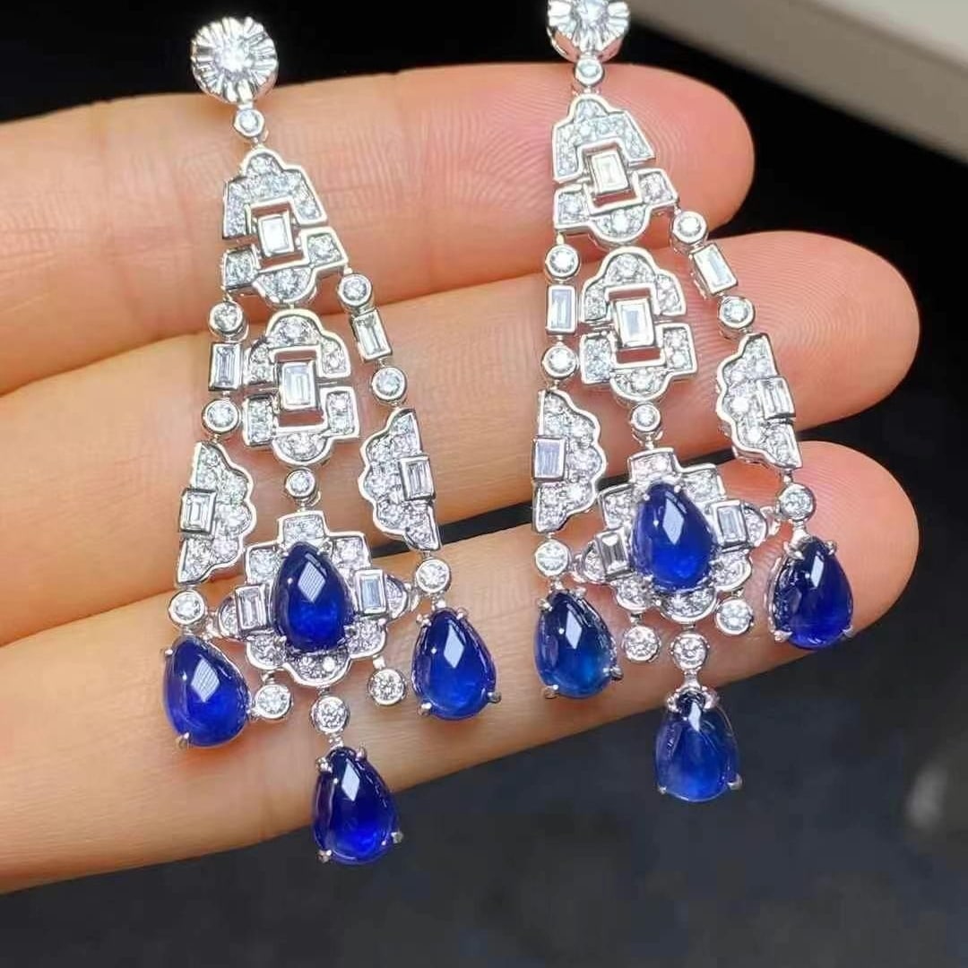 14k Gold 10.39 Ctw Natural Sapphire & Diamond Earrings: Ref:230993163 // gold content:14k gold // main gemstone:sapphire // shape:pear // carat weight:8. 83ct // color:blue // treatment:natural // // adjacent gemstone 2 : diamond // shape:multiply // carat