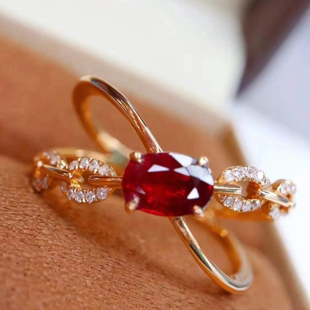 14k Gold 0.98 Ctw Natural Ruby & Diamond Ring: Ref:230993164 // gold content:14k gold // ring size:7. 25us // // main gemstone:ruby // shape:oval // carat weight:0. 88ct // color:pigeonblood red // treatment:natural // // adjacent gemstone 2 :