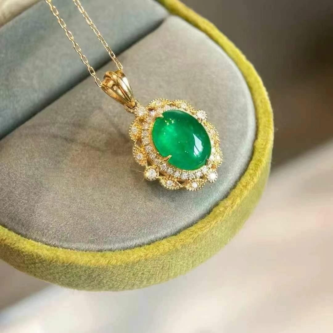 14k Gold 2.49 Ctw Vivid Green Natural Emerald & Diamond Pendant( Without Chain ): Ref:230993165 // gold content:14k gold // main gemstone:emerald // shape:oval // carat weight:2. 27ct // color:vivid green // treatment:natural // // adjacent gemstone 2 : diamond // shape:round //