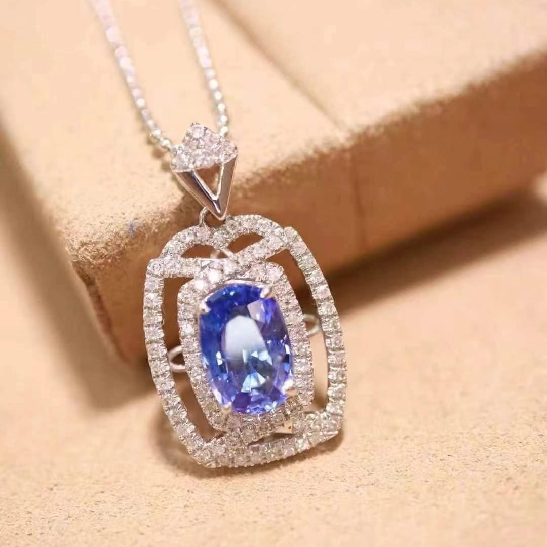14k Gold 1.94 Ctw Natural Sapphire & Diamond Pendant( Without Chain ): Ref:230993179 // gold content:14k gold // main gemstone:sapphire // shape:oval // carat weight:1. 61ct // color:blue // treatment:natural // // adjacent gemstone 2 : diamond // shape:round // carat