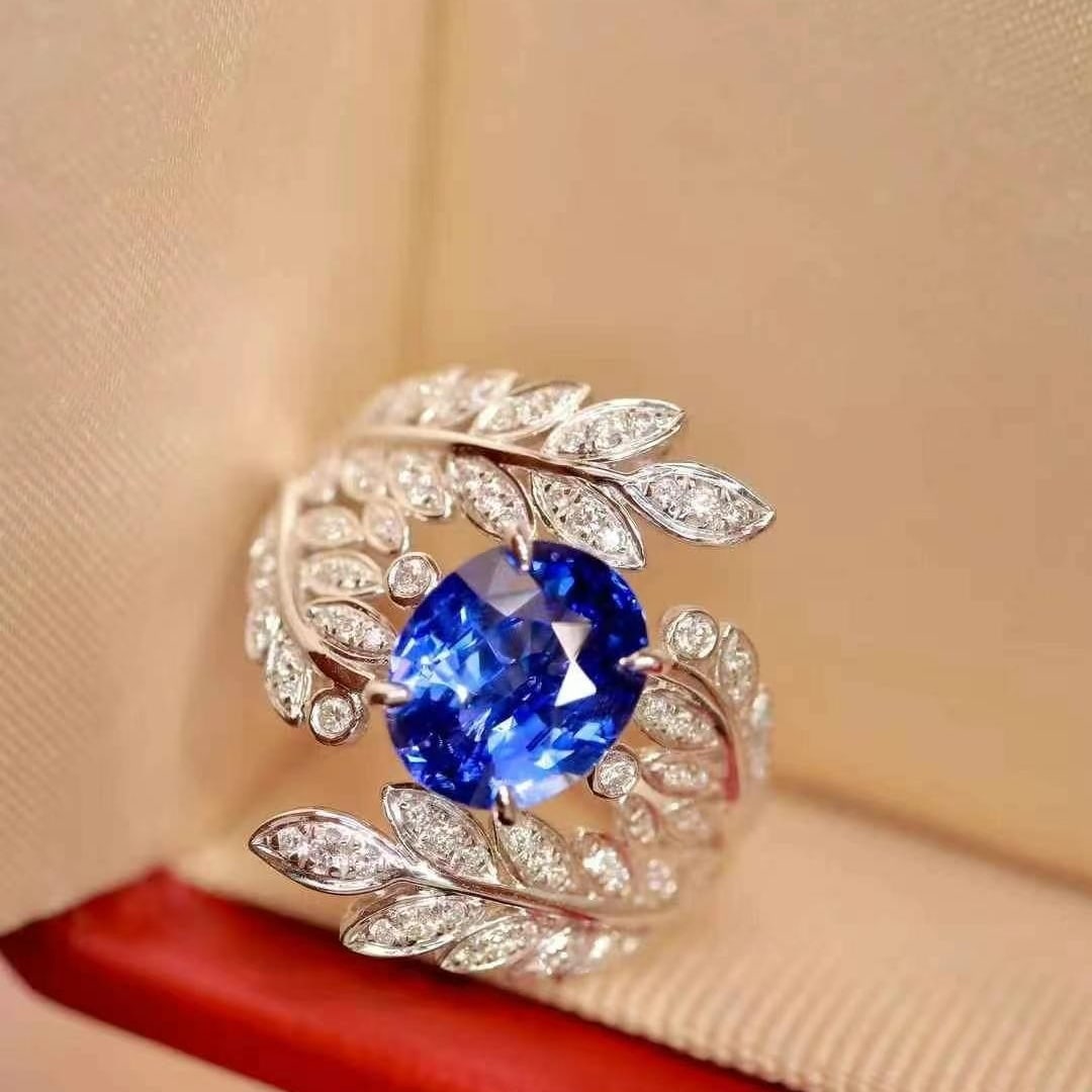 14k Gold 2.89 Ctw Vivid Blue Natural Sapphire & Diamond Ring: Ref:230993186 // gold content:14k gold // ring size:7. 25us // // main gemstone:sapphire // shape:oval // carat weight:2. 55ct // color:vivid blue // treatment:natural // // adjacent gemstone 2 : diam