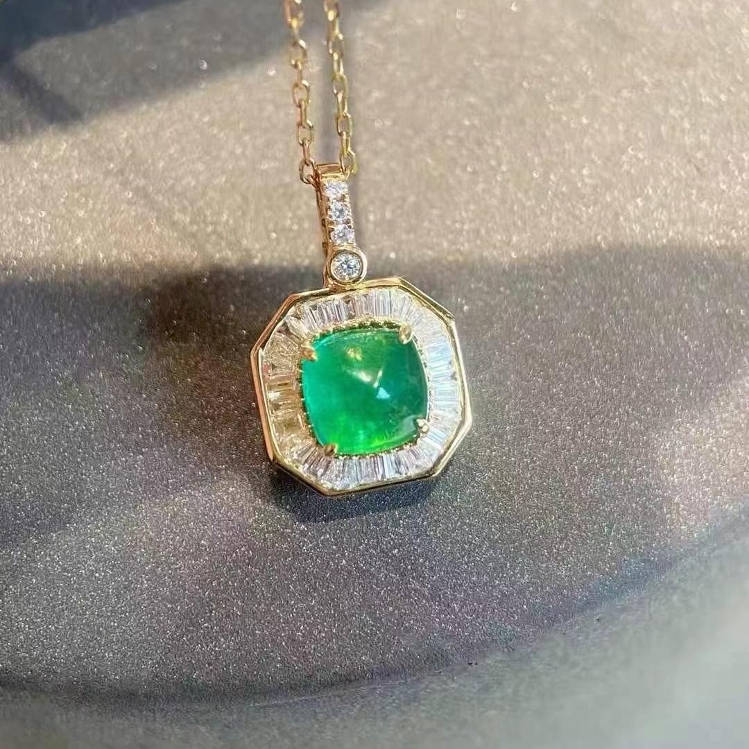 14k Gold 1.12 Ctw Vivid Green Natural Emerald & Diamond Pendant( Without Chain ): Ref:230993189 // gold content:14k gold // main gemstone:emerald // shape:suger-loaf // carat weight:0. 91ct // color:vivid green // treatment:natural // // adjacent gemstone 2 : diamond //