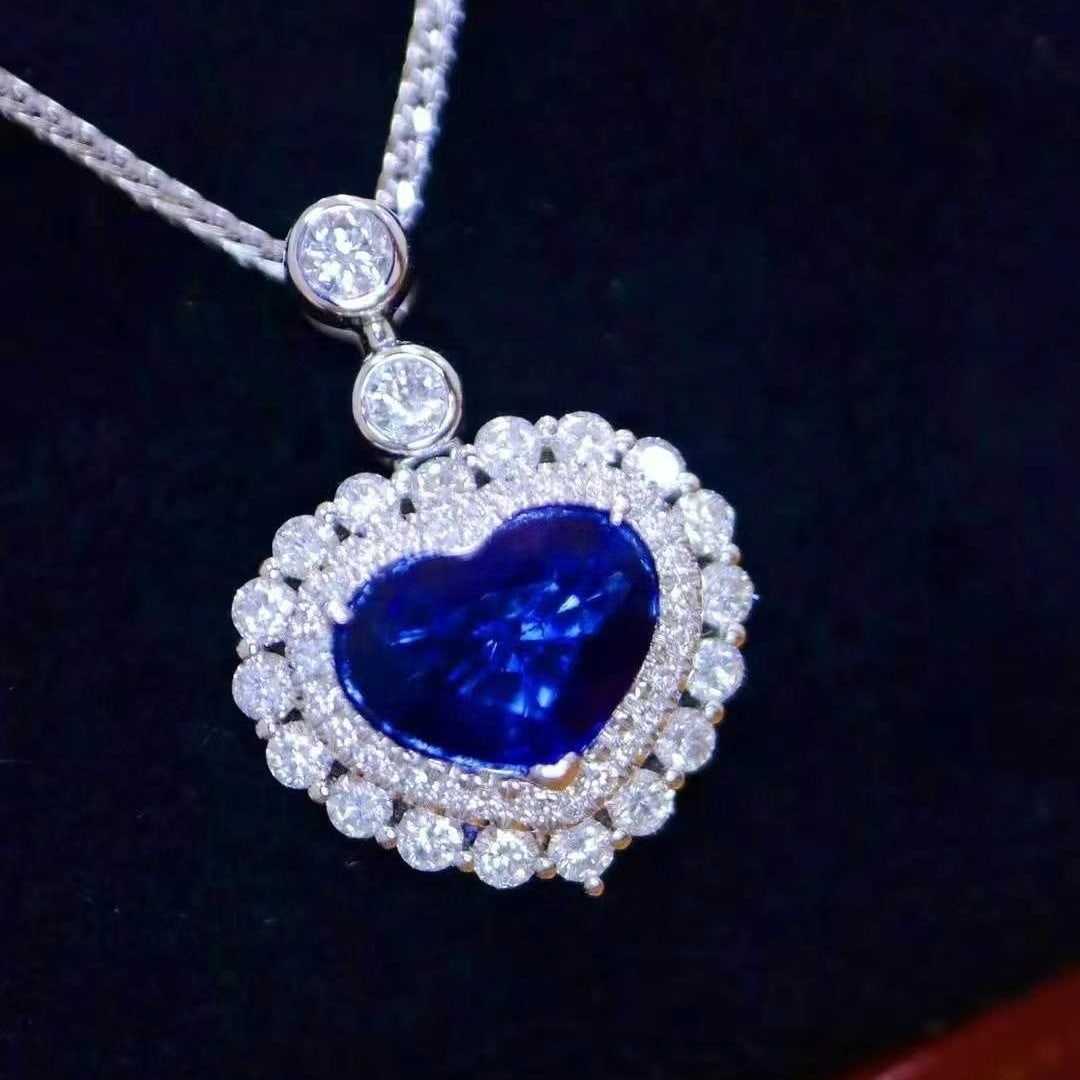 14k Gold 2.81 Ctw Natural Sapphire & Diamond Pendant( Without Chain ): Ref:230993192 // gold content:14k gold // main gemstone:sapphire // shape:heart // carat weight:2. 0ct // color:royal blue // treatment:natural // // adjacent gemstone 2 : diamond // shape:round // ca