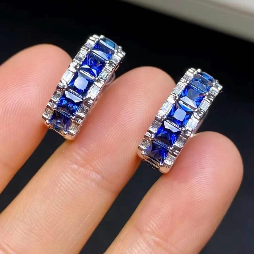 14k Gold 3.28 Ct Vivid Blue Natural Sapphire Earrings: Ref:230993199 // gold content:14k gold // main gemstone:sapphire // shape:princess // carat weight:3. 28ct // color:vivid blue // treatment:natural // Low Estimate: 10000 Condition: New High Estimate: