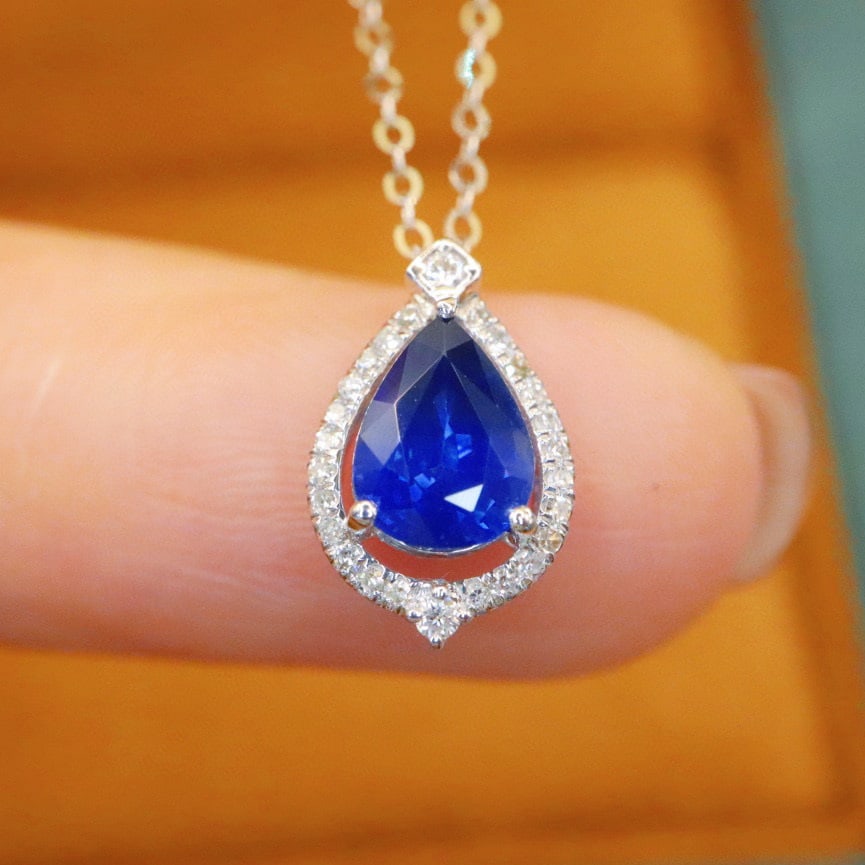 14k Gold 0.99 Ctw Natural Sapphire & Diamond Necklace: Ref:230993218 // gold content:14k gold // main gemstone:sapphire // shape:pear // carat weight:0. 90ct // color:royal blue // treatment:natural // // adjacent gemstone 2 : diamond // number of stones: