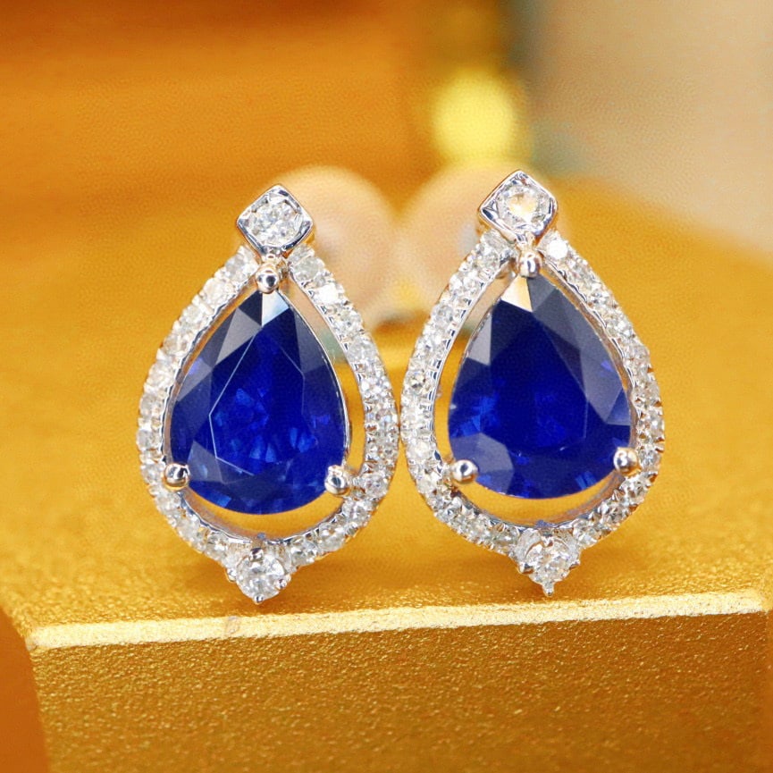 14k Gold 1.43 Ctw Natural Sapphire & Diamond Earrings: Ref:230993233 // gold content:14k gold // main gemstone:sapphire // shape:pear // carat weight:1. 26ct // color:royal blue // treatment:natural // // adjacent gemstone 2 : diamond // number of