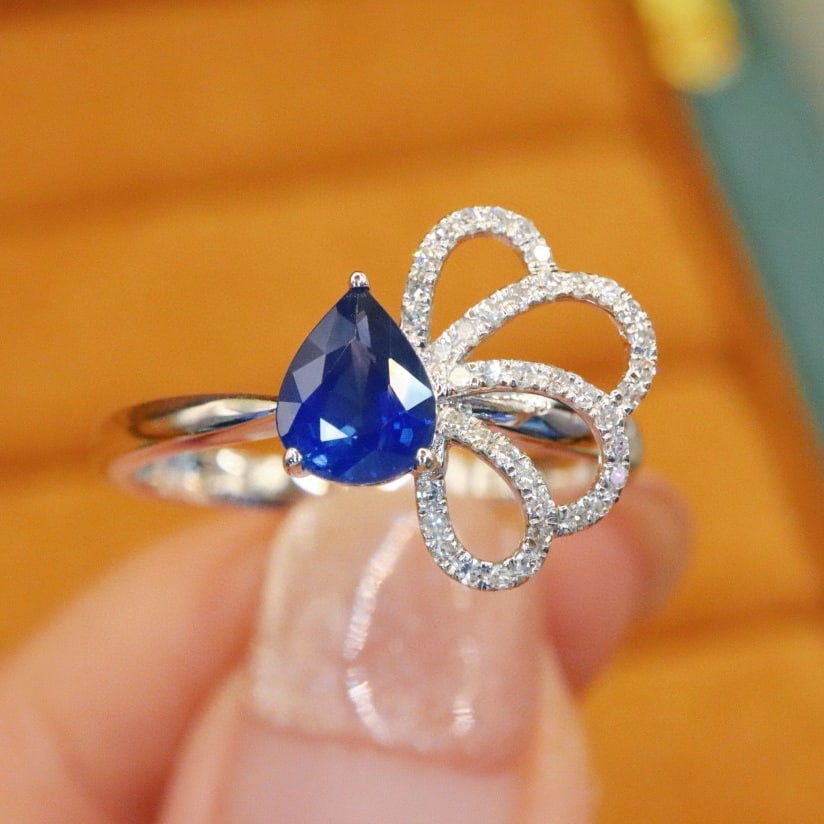 14k Gold 0.85 Ctw Natural Sapphire & Diamond Ring: Ref:230993258 // gold content:14k gold // ring size:7. 25us // // main gemstone:sapphire // shape:pear // carat weight:0. 73ct // color:royal blue // treatment:natural // // adjacent gemstone 2 :