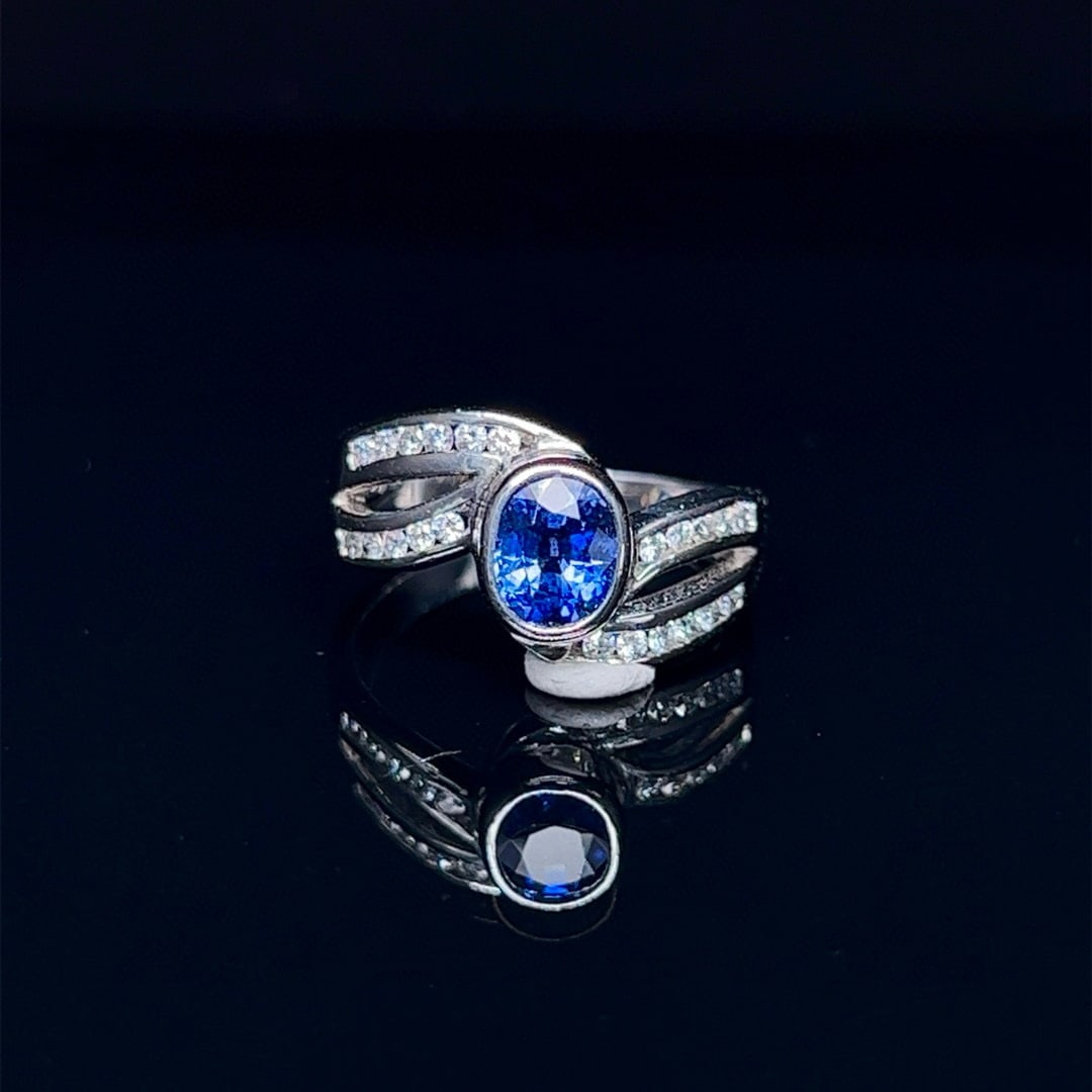 14k Gold 1.70 Ctw Natural Sapphire & Diamond Ring: Ref:230994007 // gold content:14k gold // ring size:7. 25us // // main gemstone:sapphire // shape:oval // carat weight:1. 43ct // color:cornflower blue // treatment:natural // // adjacent gemstone 2