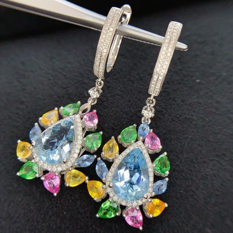 14k Gold 5.3 Ct Natural Aquamarine & Diamond Earrings: Ref:230994039 // gold content:14k gold // main gemstone:aquamarine // shape:pear // carat weight:5. 3ct // color:blue // treatment:natural // // adjacent gemstone 2 : diamond // shape:round //