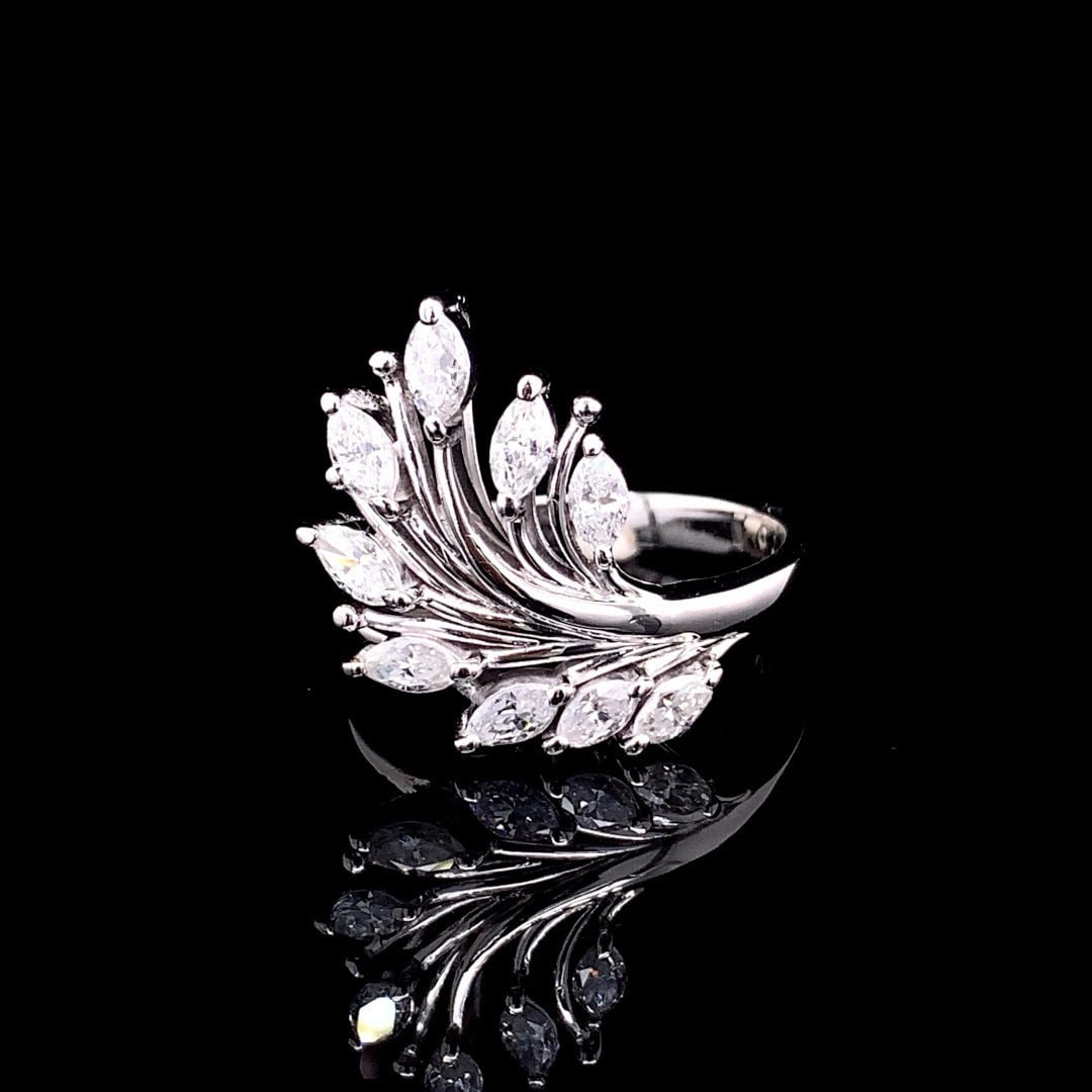 14k Gold 0.7 Ct Natural H Diamond Ring: Ref:230994043 // gold content:14k gold // ring size:7. 25us // // main gemstone:diamond // shape:marquise // carat weight:0. 7ct // clarity grade:vs-si // color:h // treatment:natural // High Estimate