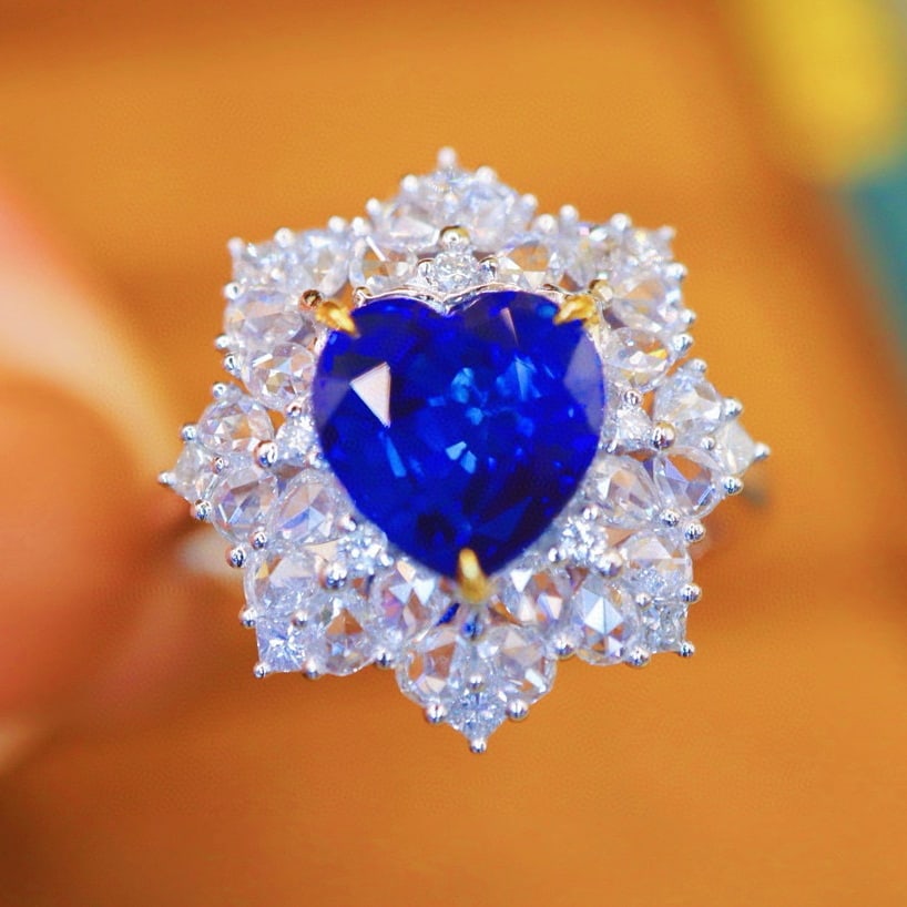 14k Gold 3.43 Ctw Natural Sapphire & Diamond Ring: Ref:230994059 // gold content:14k gold // ring size:7. 25us // // main gemstone:sapphire // shape:heart // carat weight:2. 64ct // color:royal blue // treatment:natural // // adjacent gemstone 2 : dia