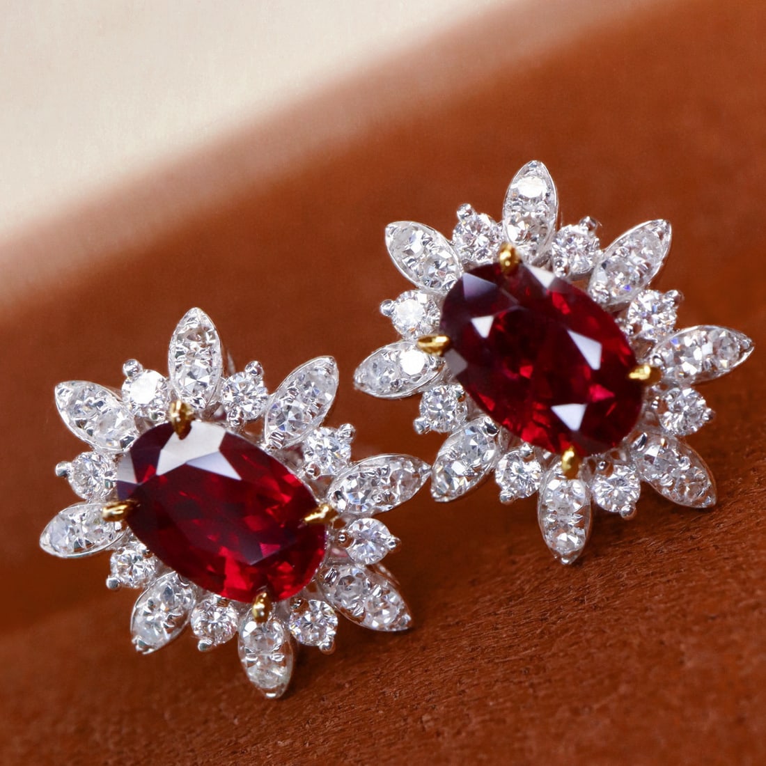 14k Gold 0.98 Ctw Natural Ruby & Diamond Earrings: Ref:230994113 // gold content:14k gold // main gemstone:ruby // shape:oval // carat weight:0. 80ct // color:pigeonblood red // treatment:natural // // adjacent gemstone 2 : diamond // shape:round //