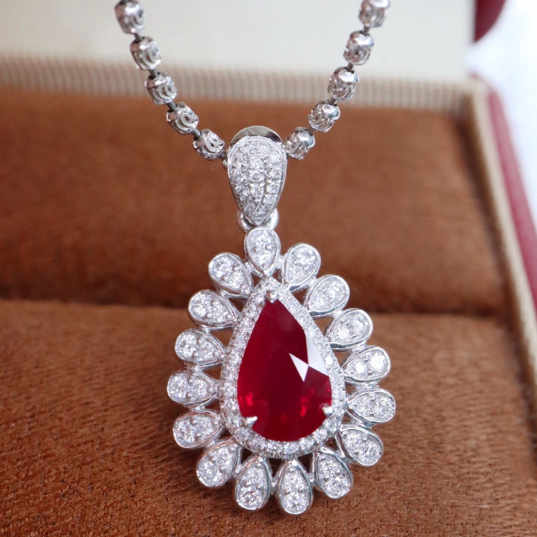14k Gold 1.46 Ctw Vivid Red Natural Ruby & Diamond Pendant( Without Chain ): Ref:230994114 // gold content:14k gold // main gemstone:ruby // shape:pear // carat weight:1. 10ct // color:vivid red // treatment:natural // // adjacent gemstone 2 : diamond // shape:round // carat w