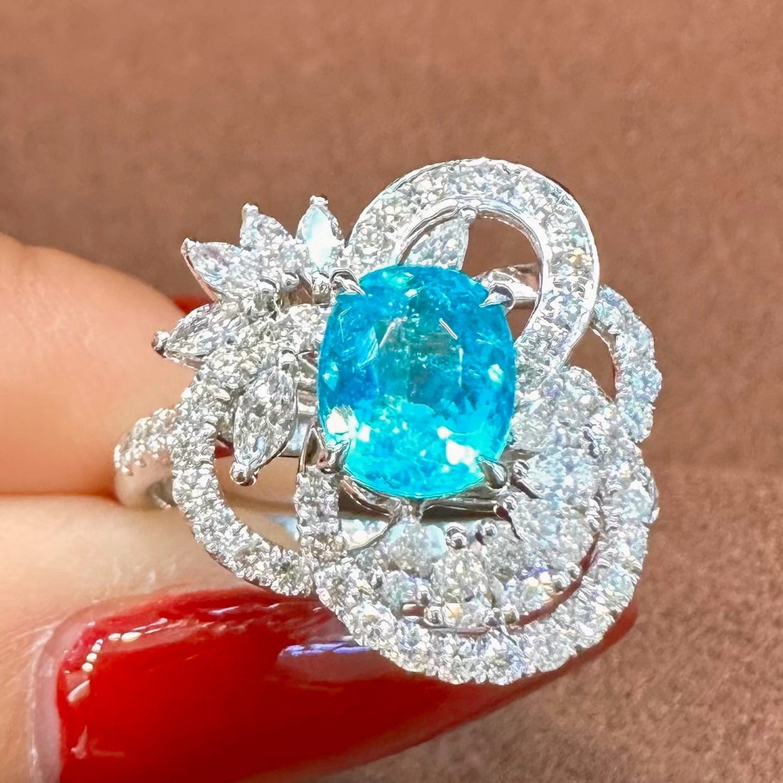 14k Gold 2.12 Ctw Natural Paraiba Tourmaline & Diamond Ring: Ref:230994119 // gold content:14k gold // ring size:7. 25us // // main gemstone:paraiba tourmaline // shape:oval // carat weight:1. 23ct // color:blue // treatment:natural // // adjacent gemstone 2 :