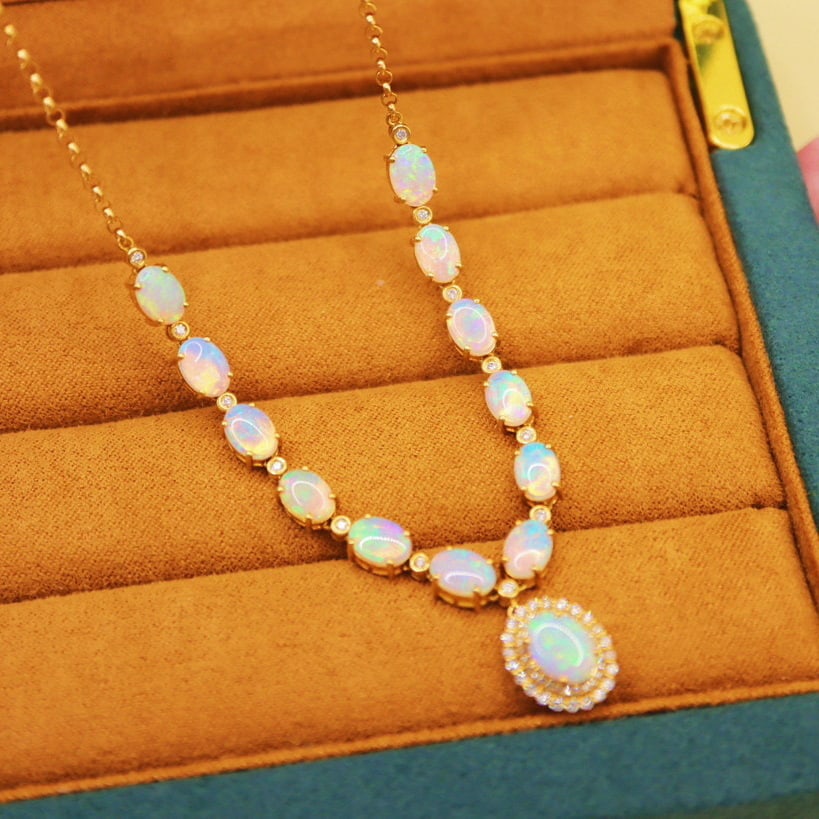 14k Gold 5.78 Ctw Natural Opal & Diamond Necklace: Ref:230994126 // gold content:14k gold // main gemstone:opal // shape:oval // carat weight:5. 35ct // color:white // treatment:natural // // adjacent gemstone 2 : diamond // number of stones:62 // sha