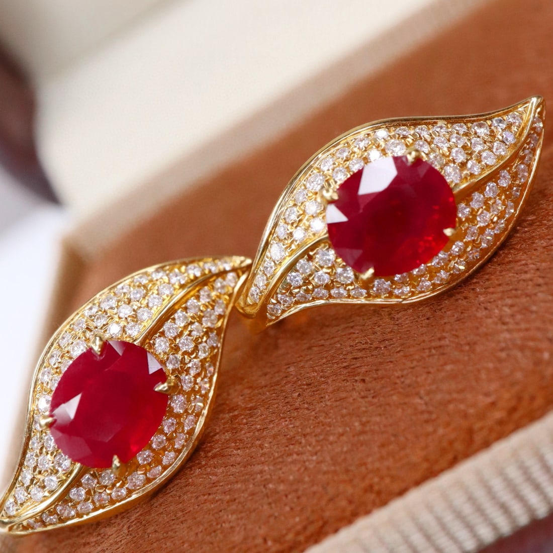 14k Gold 2.77 Ctw Natural Ruby & Diamond Earrings: Ref:230994152 // gold content:14k gold // main gemstone:ruby // shape:oval // carat weight:2. 28ct // color:pigeonblood red // treatment:natural // // adjacent gemstone 2 : diamond // shape:round //