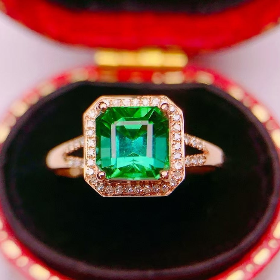 14k Gold 2.44 Ctw Natural Tourmaline & Diamond Ring: Ref:230994200 // gold content:14k gold // ring size:7. 25us // // main gemstone:tourmaline // shape:octagonal // carat weight:2. 3ct // color:green // treatment:natural // // adjacent gemstone 2 : dia