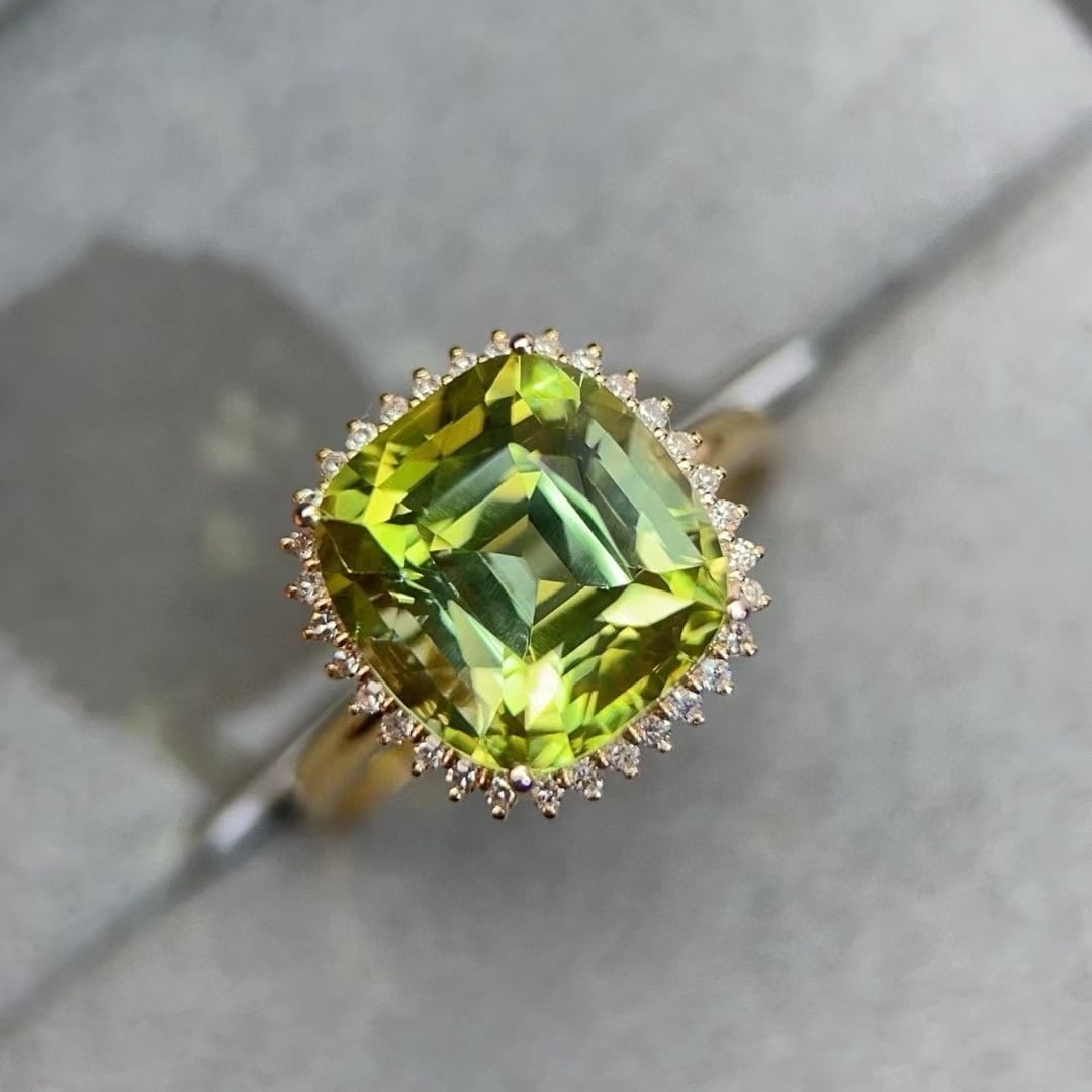 14k Gold 6.91 Ctw Natural Tourmaline & Diamond Ring: Ref:230994206 // gold content:14k gold // ring size:7. 25us // // main gemstone:tourmaline // shape:cushion // carat weight:6. 75ct // color:green // treatment:natural // // adjacent gemstone 2 : diam