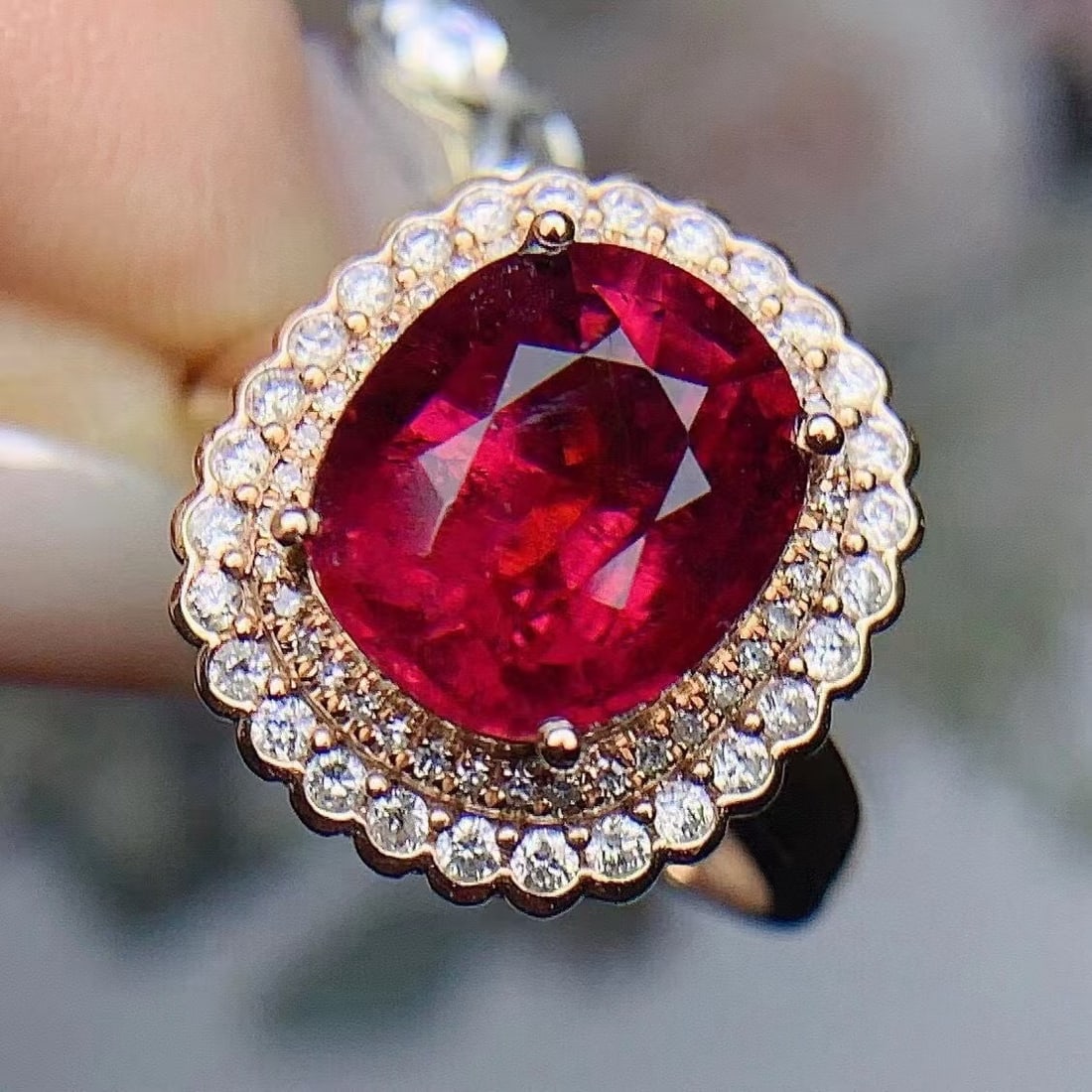 14k Gold 4.28 Ctw Natural Tourmaline & Diamond Ring: Ref:230994250 // gold content:14k gold // ring size:7. 25us // // main gemstone:tourmaline // shape:oval // carat weight:3. 9ct // color:red // treatment:natural // // adjacent gemstone 2 : diamond //