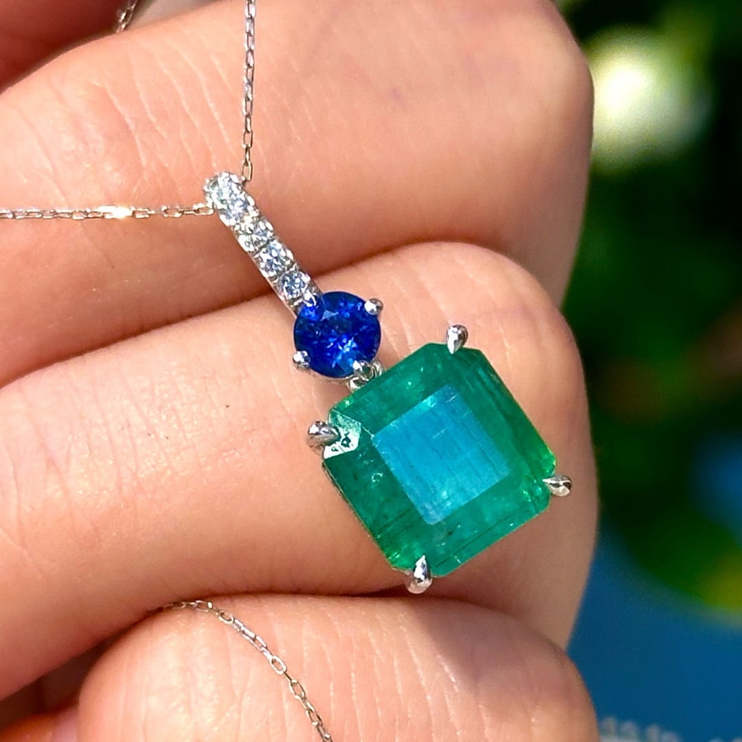 14k Gold 5.91 Ctw Natural Emerald & Sapphire Pendant( Without Chain ): Ref:230994262 // gold content:14k gold // main gemstone:emerald // shape:octagonal // carat weight:5. 52ct // color:green // treatment:natural // // adjacent gemstone 2 : sapphire // shape:round // ca