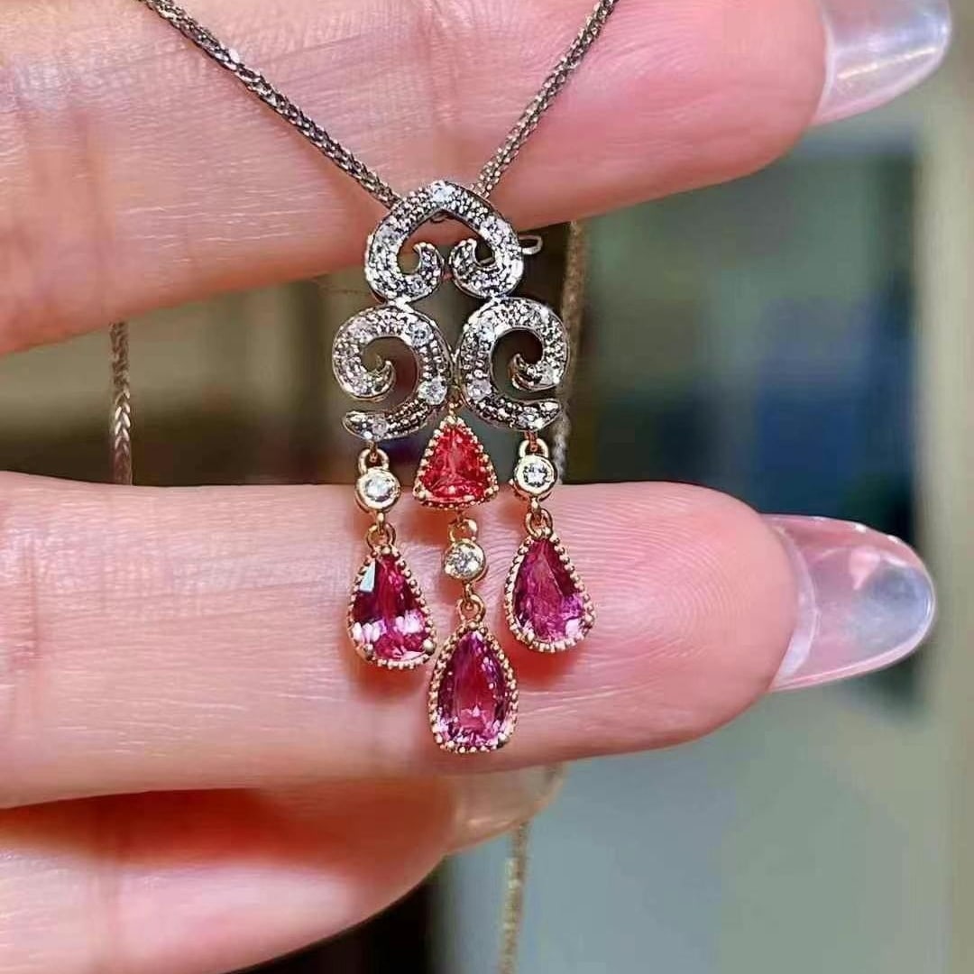 14k Gold 1.20 Ctw Natural Padparadscha Sapphire & Diamond Pendant( Without Chain ): Ref:230994266 // gold content:14k gold // main gemstone:padparadscha sapphire // shape:pear // carat weight:1. 09ct // color:orangish pink // treatment:natural // // adjacent gemstone 2 : diamond // s